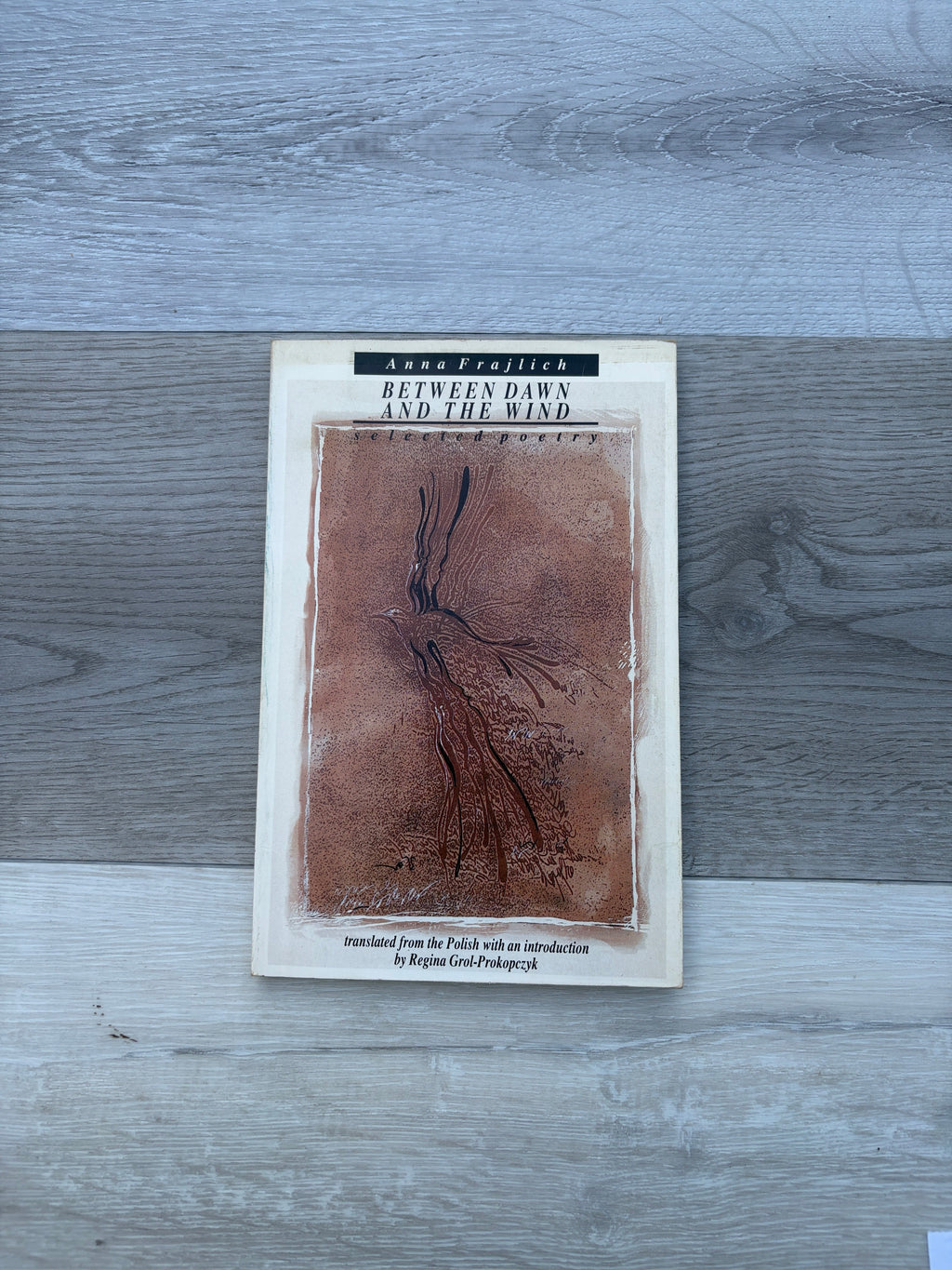 Between Dawn and the Wind: Selected Poetry
