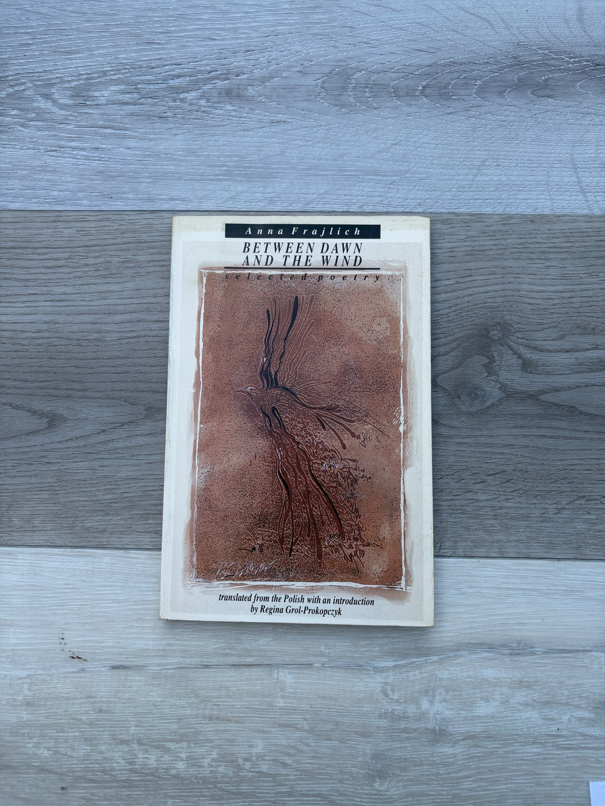 Between Dawn and the Wind: Selected Poetry
