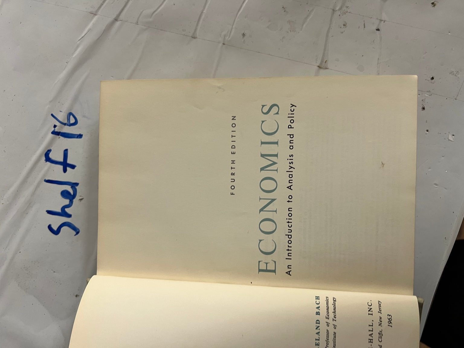 Title page of Economics: An Introduction to Analysis and Policy, Fourth Edition