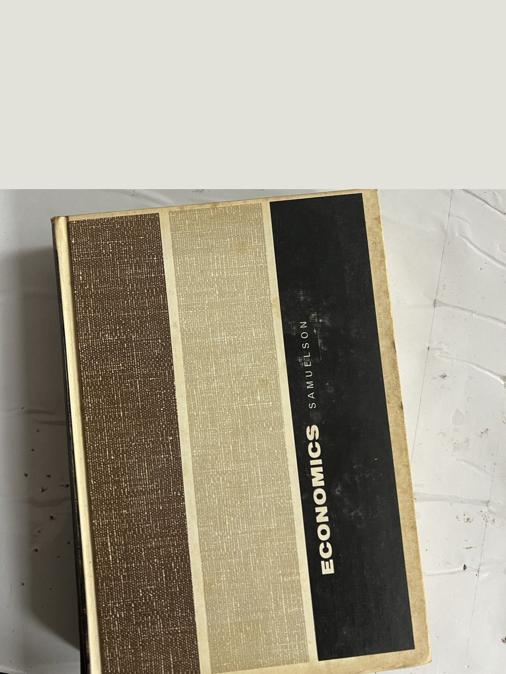 Clean rotated cover of Economics by Paul A. Samuelson