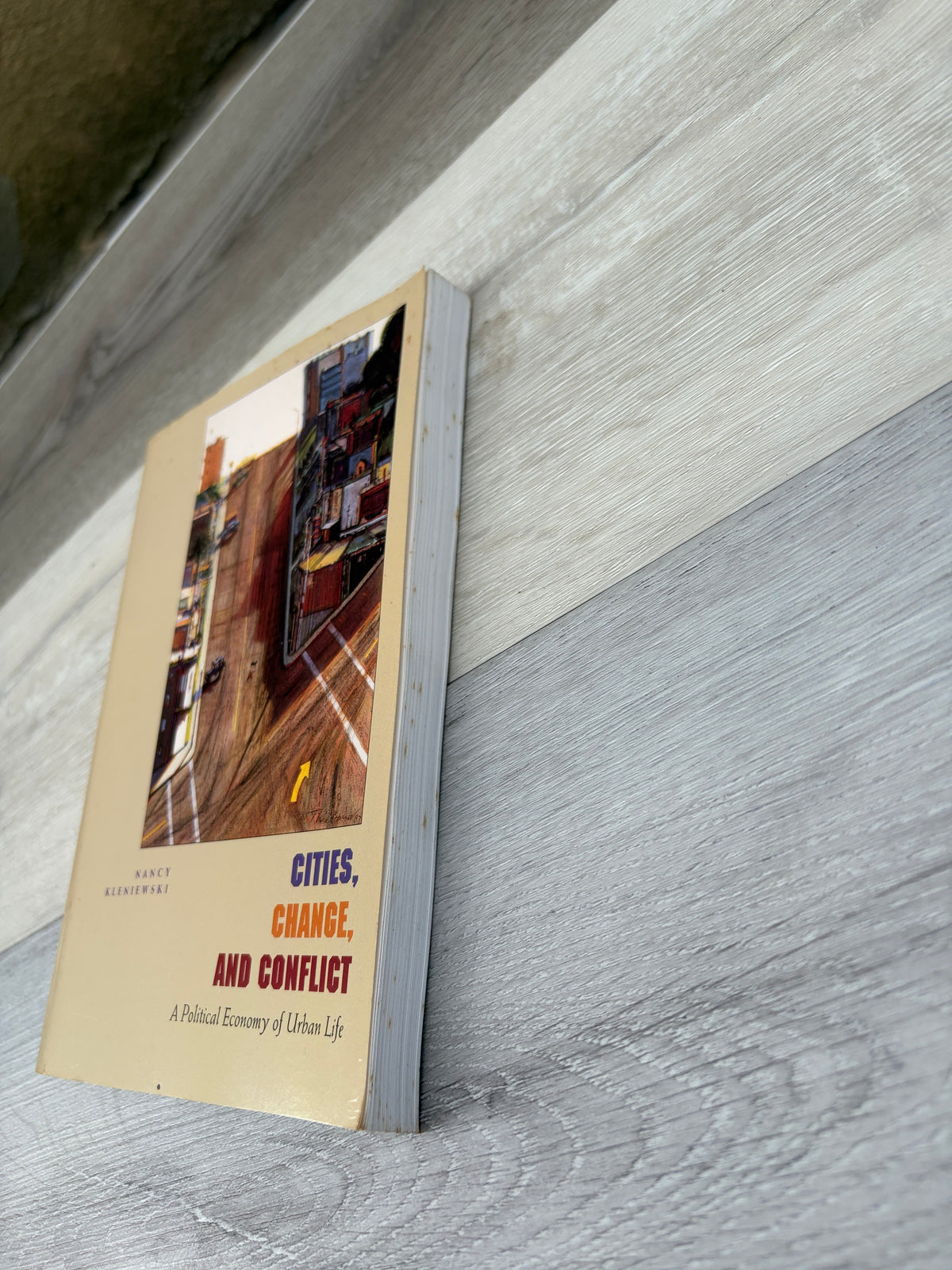 Cities, Change, and Conflict: A Political Economy of Urban Life