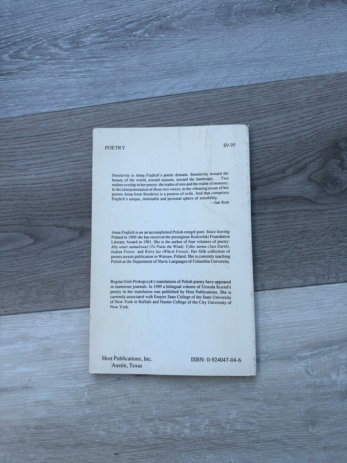 Between Dawn and the Wind: Selected Poetry