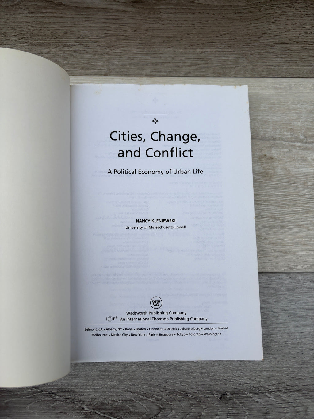 Cities, Change, and Conflict: A Political Economy of Urban Life