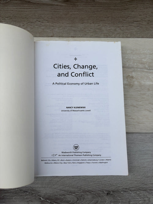 Cities, Change, and Conflict: A Political Economy of Urban Life